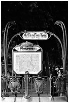 Embrace at the entrance of a metro station. Paris, France ( black and white)