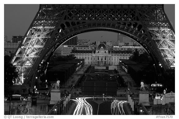 Ecole Militaire (Military Academy) seen through Tour Eiffel  at dusk. Paris, France (black and white)