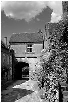 Street and old town gate, Vezelay. Burgundy, France (black and white)