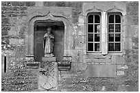 Statue and window, Fontenay Abbey. Burgundy, France ( black and white)