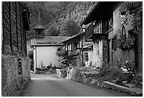 Street and church in village of Le Tour, Chamonix Valley. France (black and white)
