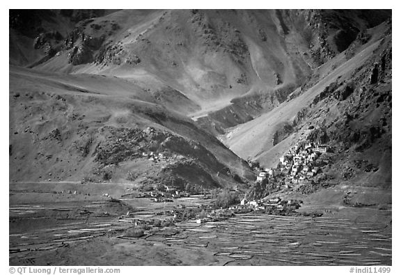 Cultivated fields, village, gompa, and barren mountains, Zanskar, Jammu and Kashmir. India (black and white)