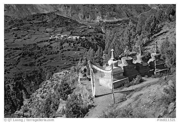 Prayer flag, chortens, and verdant valley below, Himachal Pradesh. India (black and white)