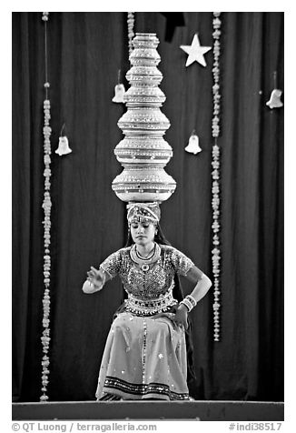 Rajasthani dancer balancing jars on head. New Delhi, India