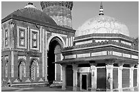 Tomb of Imam Zamin, Alai Darweza gate, and base of  Qutb Minar. New Delhi, India ( black and white)