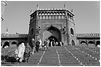 Muslim worshippers climbing  Jama Masjid South Gate. New Delhi, India ( black and white)