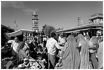 Sadar Market, with women in colorful sari and clock tower. Jodhpur, Rajasthan, India ( black and white)