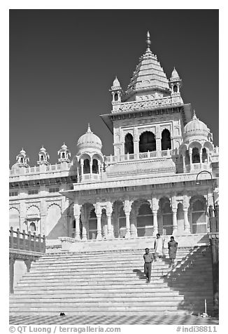 Tourists walking down steps in front of Jaswant Thada. Jodhpur, Rajasthan, India (black and white)