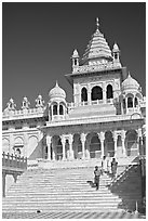 Tourists walking down steps in front of Jaswant Thada. Jodhpur, Rajasthan, India ( black and white)