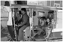 Rickshaw transporting schoolchildren. Jodhpur, Rajasthan, India ( black and white)