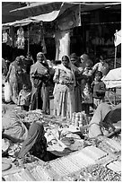 Women looking at jewelry stand in Sardar market. Jodhpur, Rajasthan, India ( black and white)
