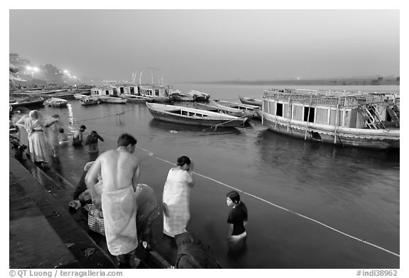 Ritual bath in the Ganga River at dawn. Varanasi, Uttar Pradesh, India