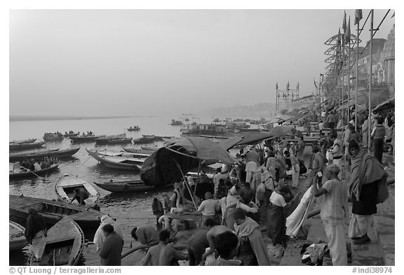 Steps of Dasaswamedh Ghat with crowd at sunrise. Varanasi, Uttar Pradesh, India (black and white)