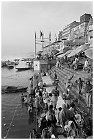 People about to bathe in the Ganga River at sunrise. Varanasi, Uttar Pradesh, India (black and white)