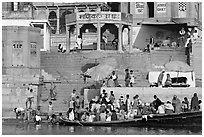 Boats loaded with pilgrims and steps, Manikarnika Ghat. Varanasi, Uttar Pradesh, India (black and white)