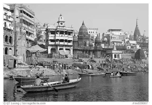 Rowboat and Manikarnika Ghat. Varanasi, Uttar Pradesh, India (black and white)