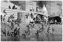 Hindu people on the steps of Sankatha Ghat. Varanasi, Uttar Pradesh, India ( black and white)