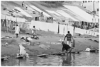 Washing and drying laundry on Ganga riverbank. Varanasi, Uttar Pradesh, India (black and white)