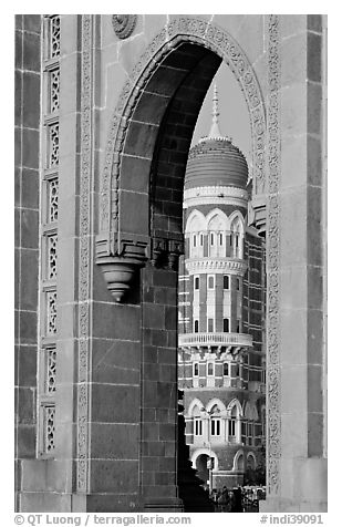 Taj Mahal Palace Hotel seen through arch of Gateway of India. Mumbai, Maharashtra, India (black and white)