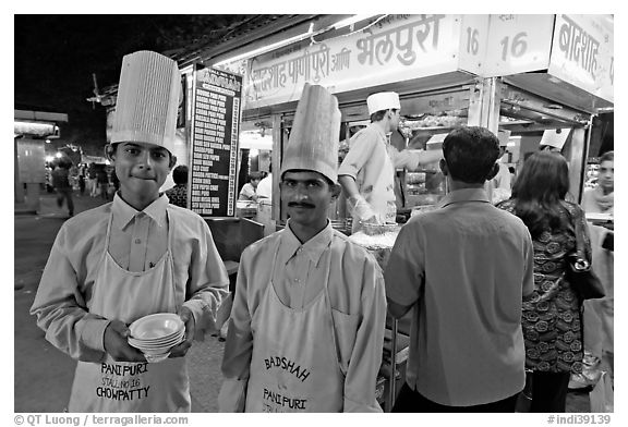 Cooks in front of Panipuri stall, Chowpatty Beach. Mumbai, Maharashtra, India (black and white)