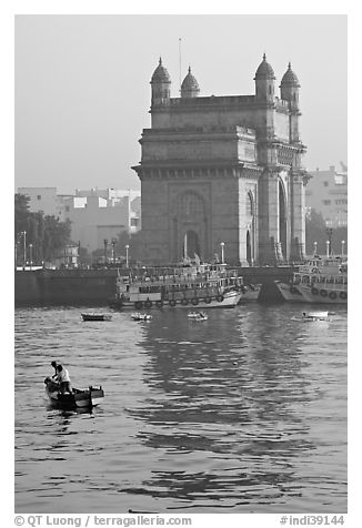 Small boat and Gateway of India, early morning. Mumbai, Maharashtra, India
