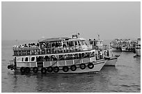 Tour boat at twilight. Mumbai, Maharashtra, India ( black and white)