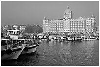 Tour boats and Taj Mahal Palace, morning. Mumbai, Maharashtra, India (black and white)
