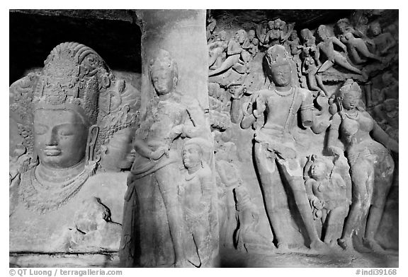 Mahesh Murti and Gangadhara Siva carved in rock, main  Elephanta cave. Mumbai, Maharashtra, India (black and white)