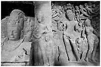 Mahesh Murti and Gangadhara Siva carved in rock, main  Elephanta cave. Mumbai, Maharashtra, India ( black and white)