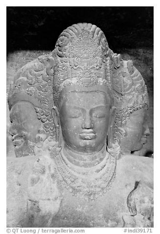 Triple-headed Shiva sculpture, Elephanta caves. Mumbai, Maharashtra, India (black and white)