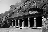 Outside of rock-cut cave, Elephanta Island. Mumbai, Maharashtra, India (black and white)