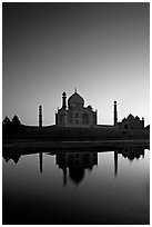 Taj Mahal reflected in  Yamuna River at sunset. Agra, Uttar Pradesh, India (black and white)