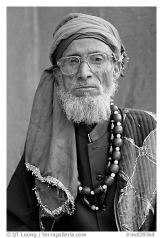Elderly bespectacled man. Fatehpur Sikri, Uttar Pradesh, India