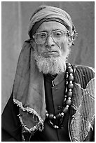 Elderly bespectacled man. Fatehpur Sikri, Uttar Pradesh, India ( black and white)