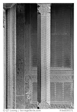 Carved columns and wall of the Rumi Sultana building. Fatehpur Sikri, Uttar Pradesh, India (black and white)
