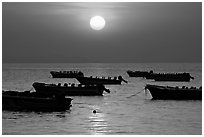 Boats anchored in bay and sunrise, Dona Paula. Goa, India ( black and white)