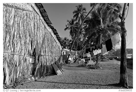 Laundry and beachfront hut, Dona Paula. Goa, India (black and white)