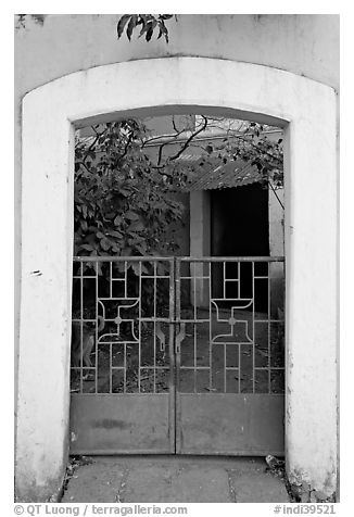 Gate, yard, and house, Panjim. Goa, India