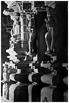 Statues in the corridor (pradakshina), Parsvanatha temple, Eastern Group. Khajuraho, Madhya Pradesh, India ( black and white)