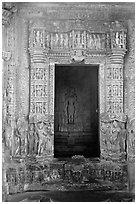 Inner sanctum with flowers and Vishnu image, Javari Temple, Eastern Group. Khajuraho, Madhya Pradesh, India (black and white)