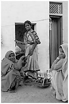Women cooking outside in village. Khajuraho, Madhya Pradesh, India ( black and white)