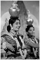 Women dancing with jars on head, Kandariya show. Khajuraho, Madhya Pradesh, India (black and white)