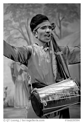 Man performing at Kandariya art and culture show. Khajuraho, Madhya Pradesh, India (black and white)