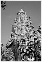 Morning Puja in front of Lakshmana temple. Khajuraho, Madhya Pradesh, India (black and white)