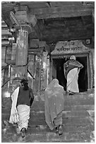 Women climbing up stairs on Matangesvara temple. Khajuraho, Madhya Pradesh, India ( black and white)