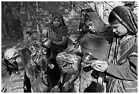 Women offering to an image at Matangesvara temple. Khajuraho, Madhya Pradesh, India ( black and white)