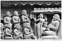 Sculpture of royal court scene, Lakshmana temple. Khajuraho, Madhya Pradesh, India ( black and white)