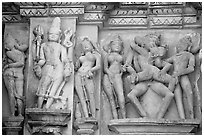 Apsaras and mithuna, Kadariya-Mahadeva temple. Khajuraho, Madhya Pradesh, India (black and white)