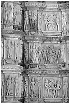 Carvings on the outside of Kadariya-Mahadeva temple including erotic figures. Khajuraho, Madhya Pradesh, India ( black and white)
