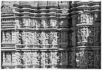 Sculptures on the outside of Kadariya-Mahadeva temple. Khajuraho, Madhya Pradesh, India ( black and white)